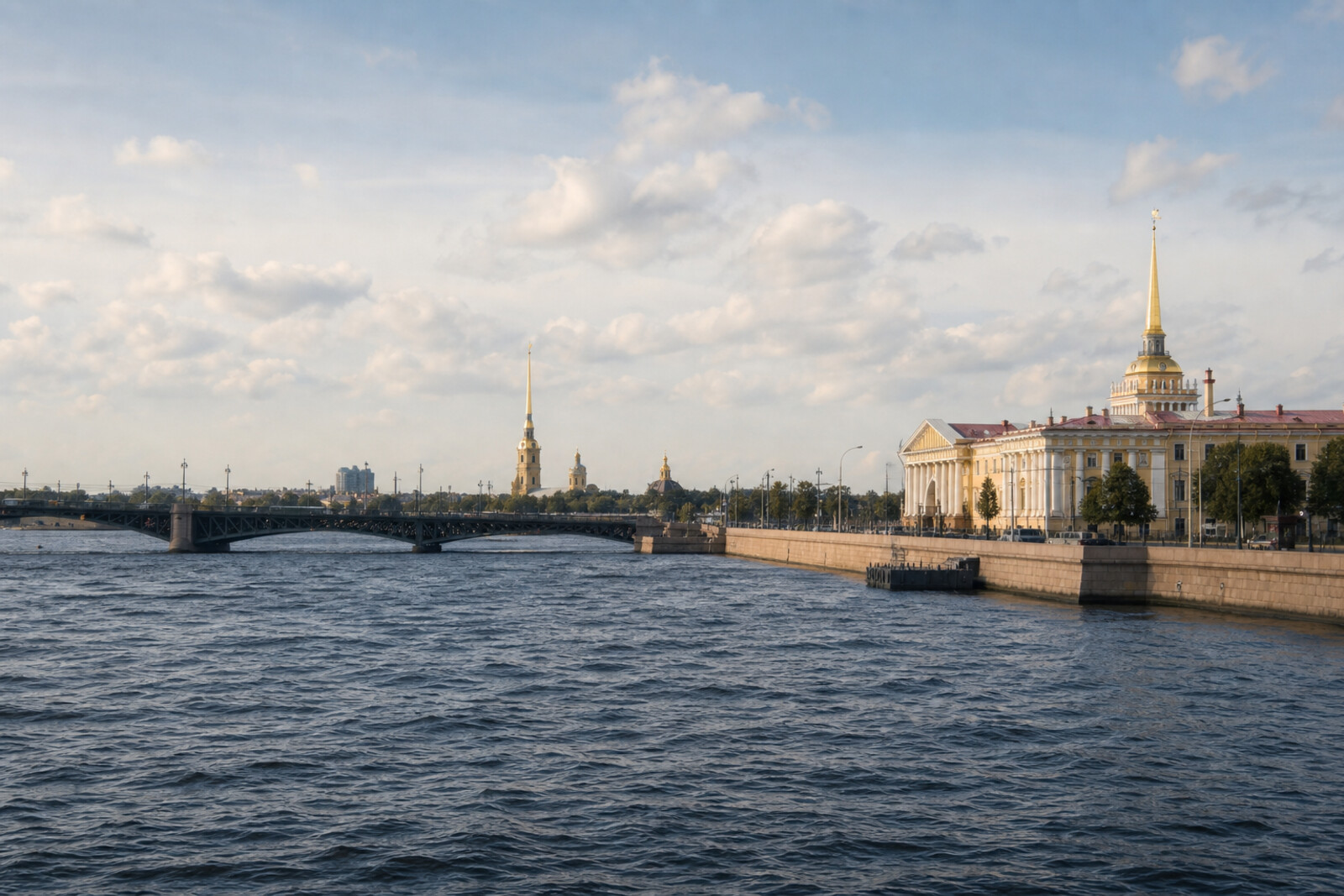 The golden spire of Main Admiralty, the Neva, Palace Bridge, and the spire of Peter and Paul Cathedral aligned along one city axis.