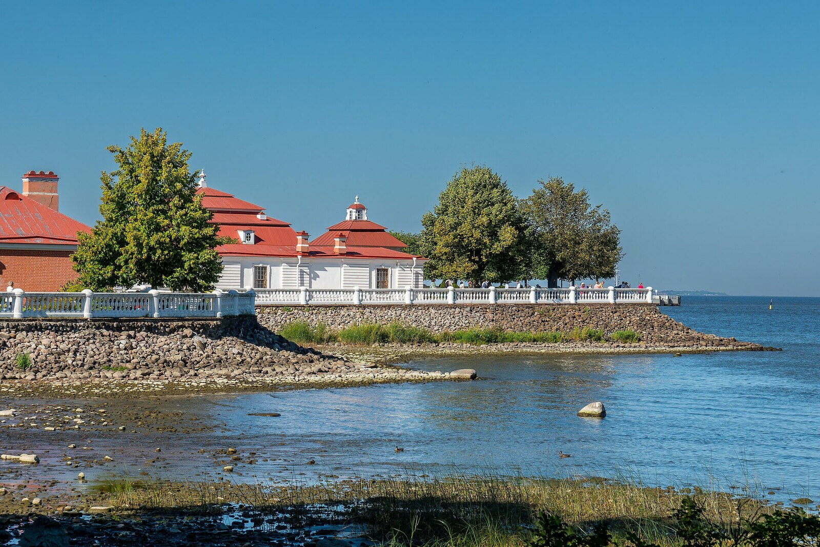 The Peterhof Sea Terrace with a white balustrade beside the Gulf of Finland.