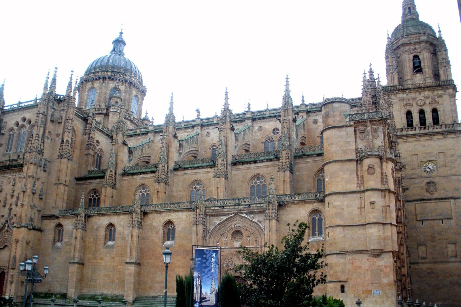 The tall façade and tower of the New Cathedral of Salamanca.