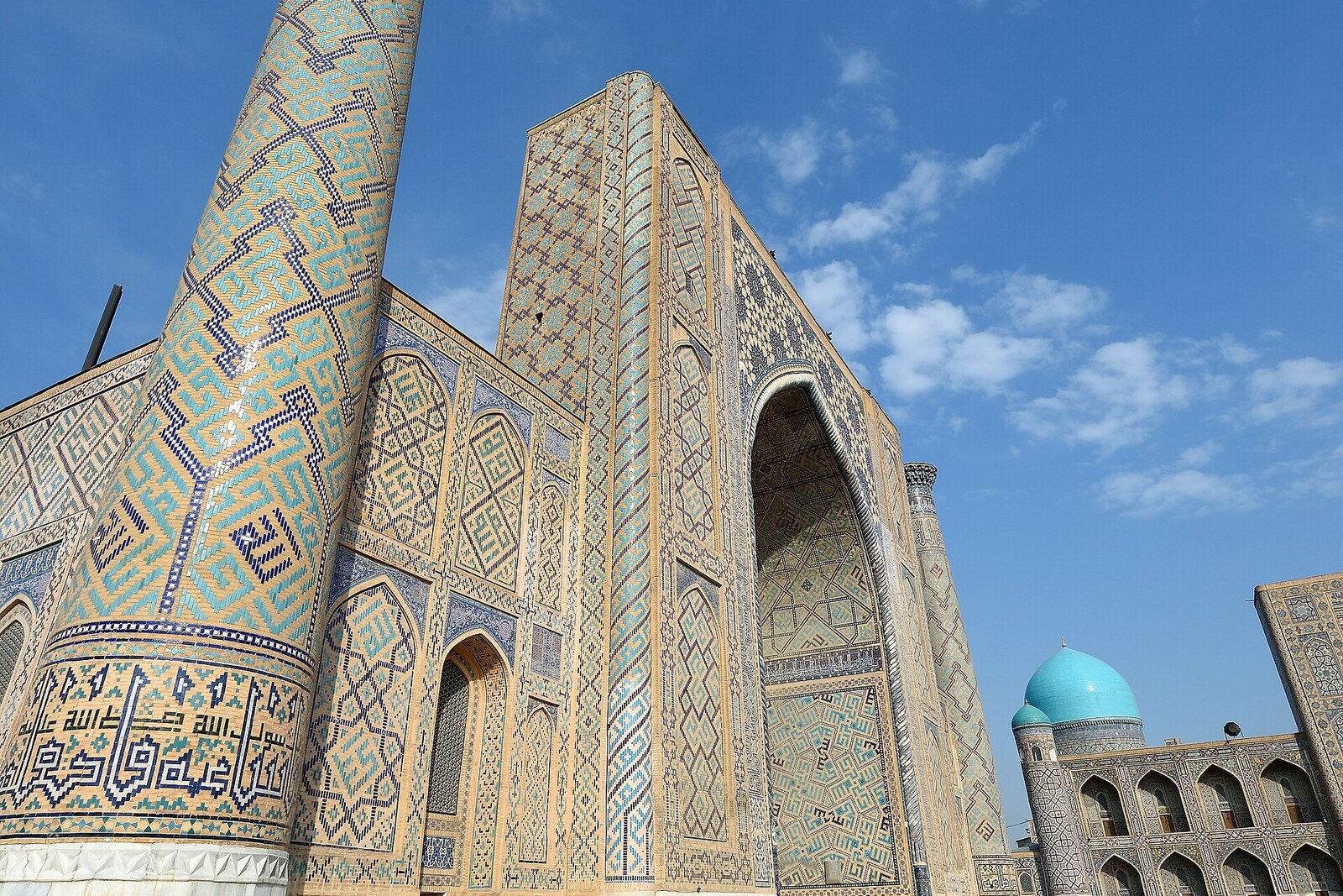 The main portal of Ulugh Beg Madrasa with star-patterned mosaics