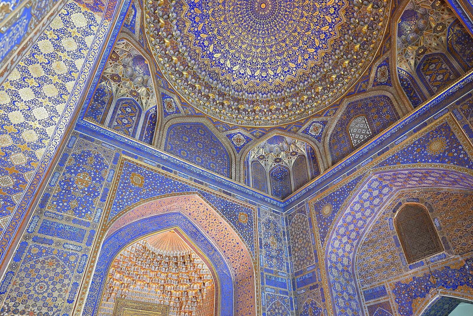 The gilded dome, mihrab, and ornamentation of the Tilla-Kori prayer hall