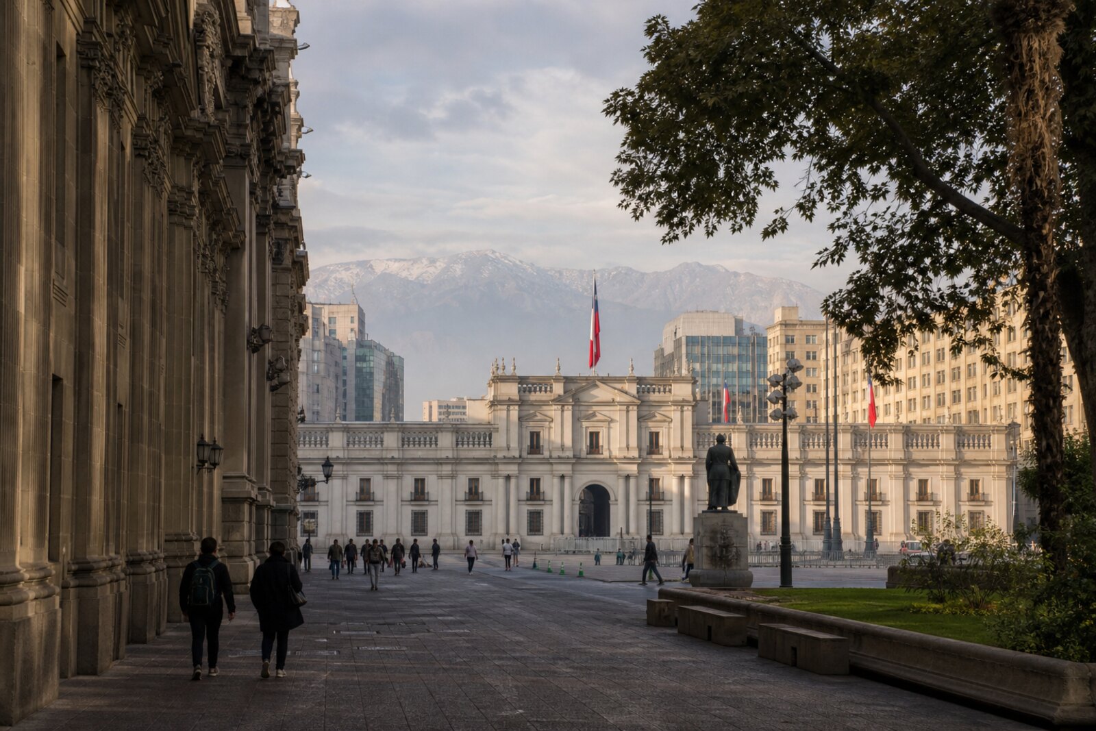 Santiago's civic axis with La Moneda, stone facades, and the Andes in the distance
