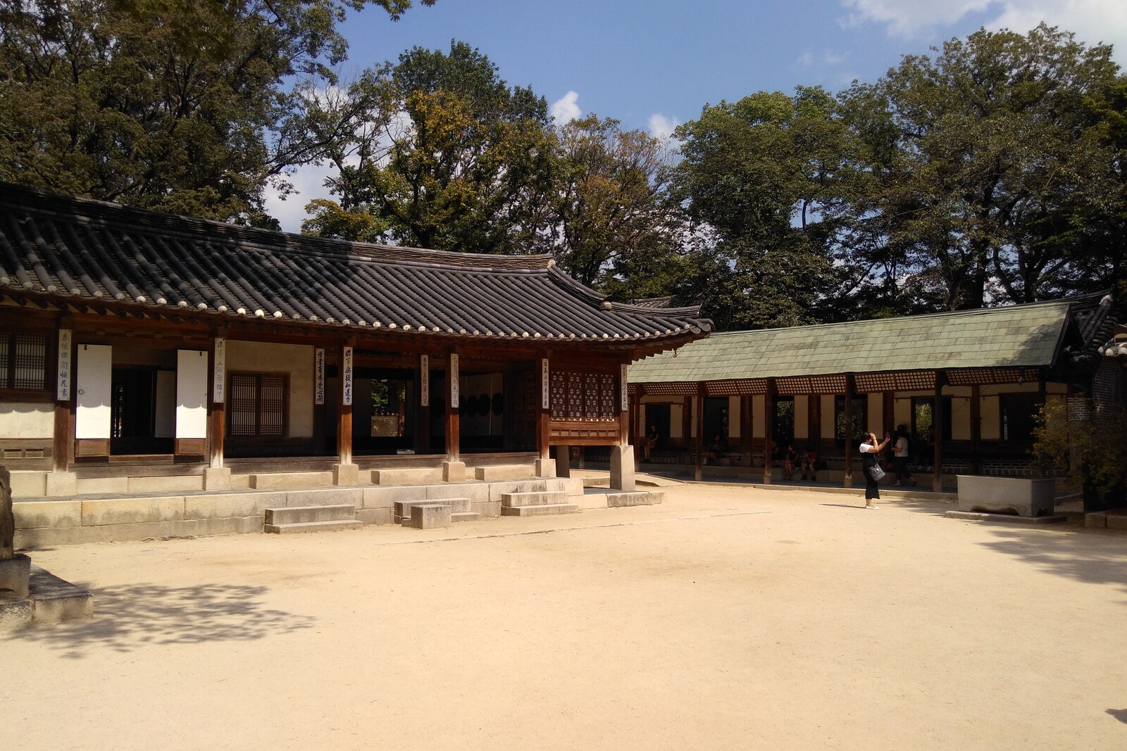 Unpainted wooden facades of the Nakseonjae residential complex.