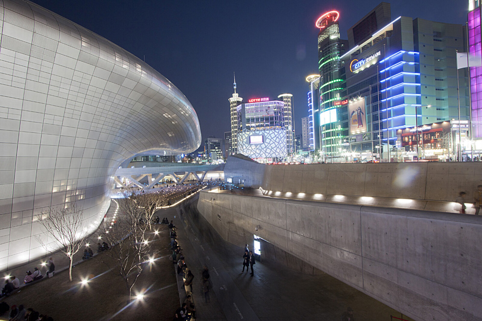 DDP at blue hour—a silver building with flowing lines and lighting