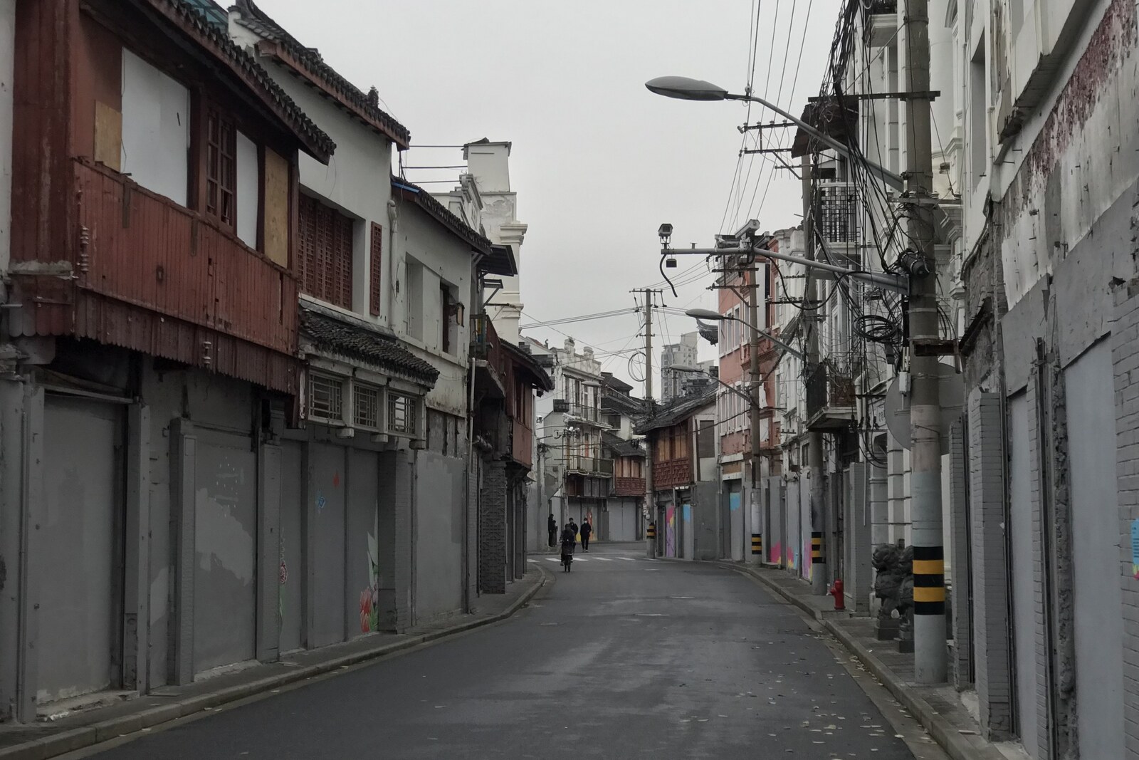 Fangbang Middle Road with wooden facades and closed shops