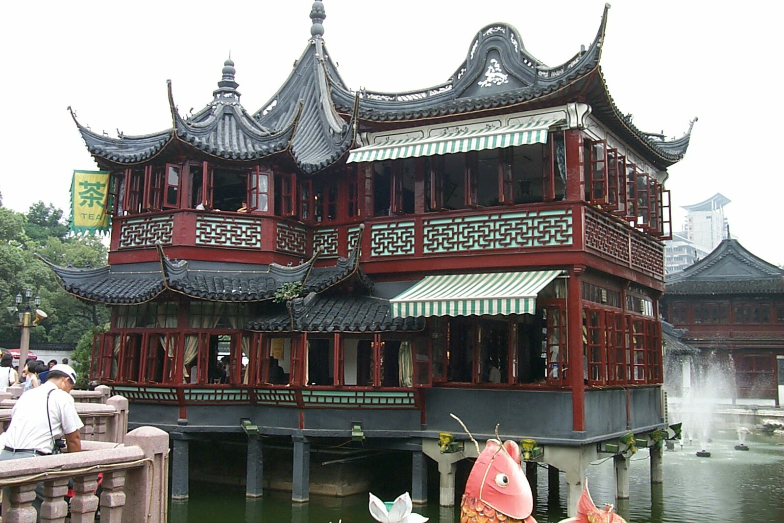 Huxinting tea house over the water, with a zigzag bridge and willows