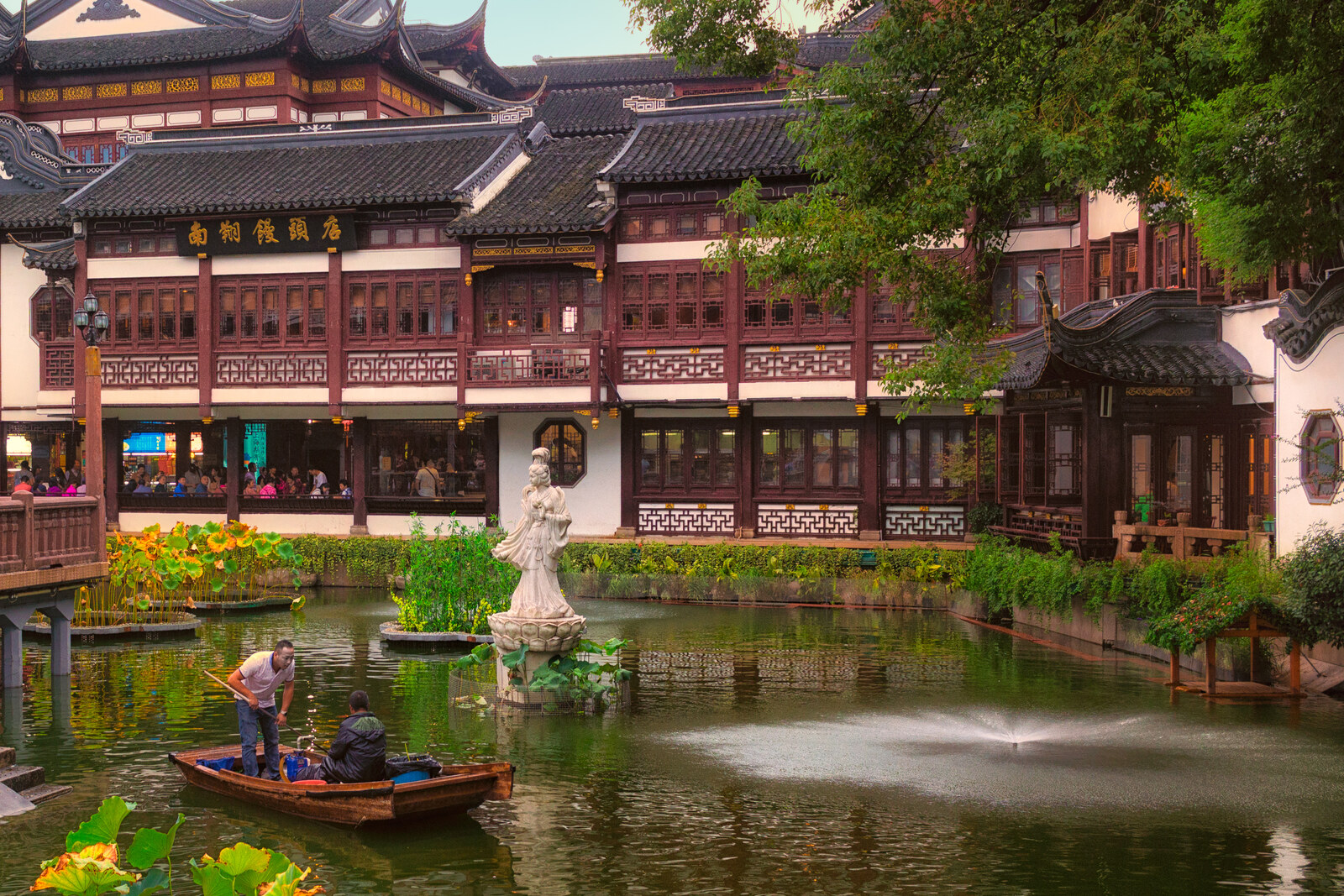 Pavilions of Yu Garden and a pond with willows and golden carp