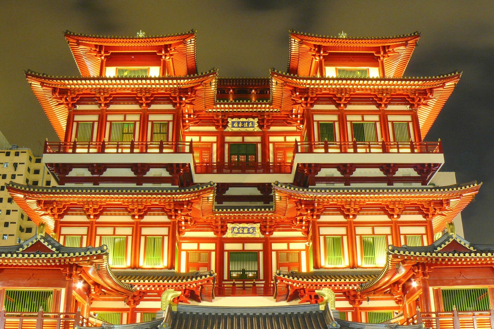 The red façade of the Buddha Tooth Relic Temple in Singapore's Chinatown.