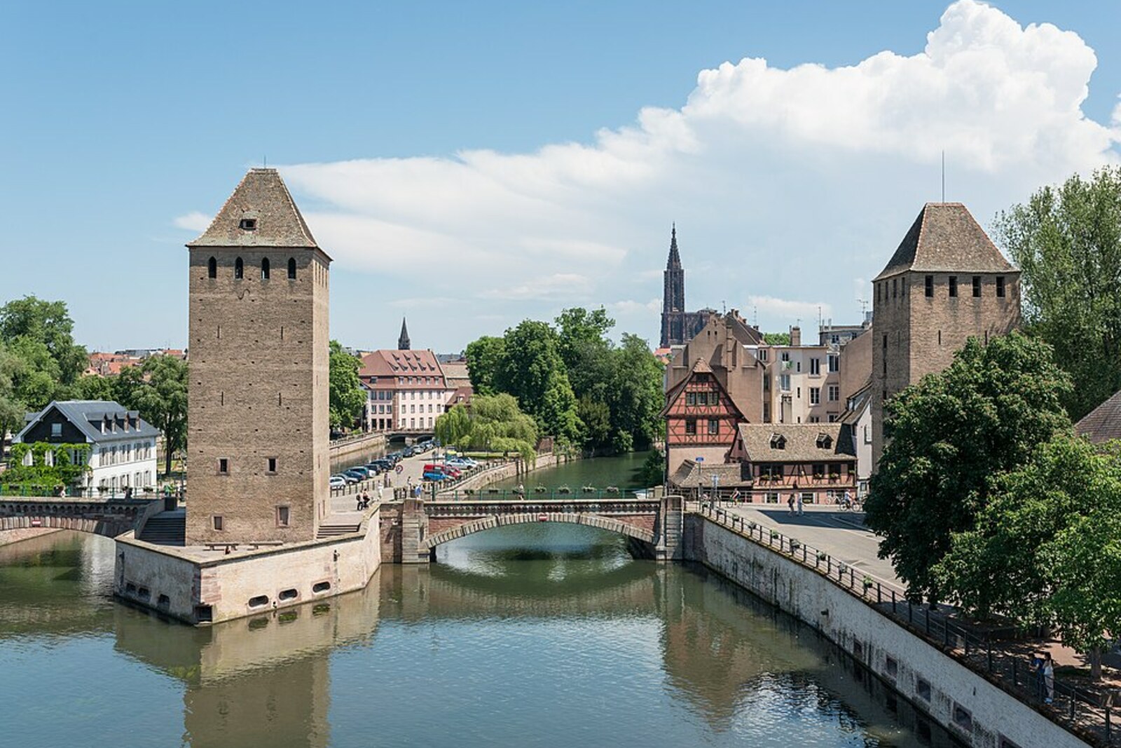 The towers of the Covered Bridges in Strasbourg above the channels of the Ill.