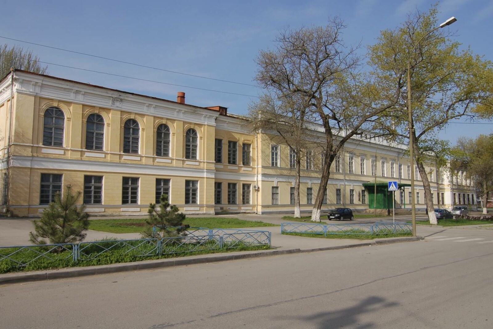 The long light-colored facade of Chekhov's former Taganrog gymnasium.