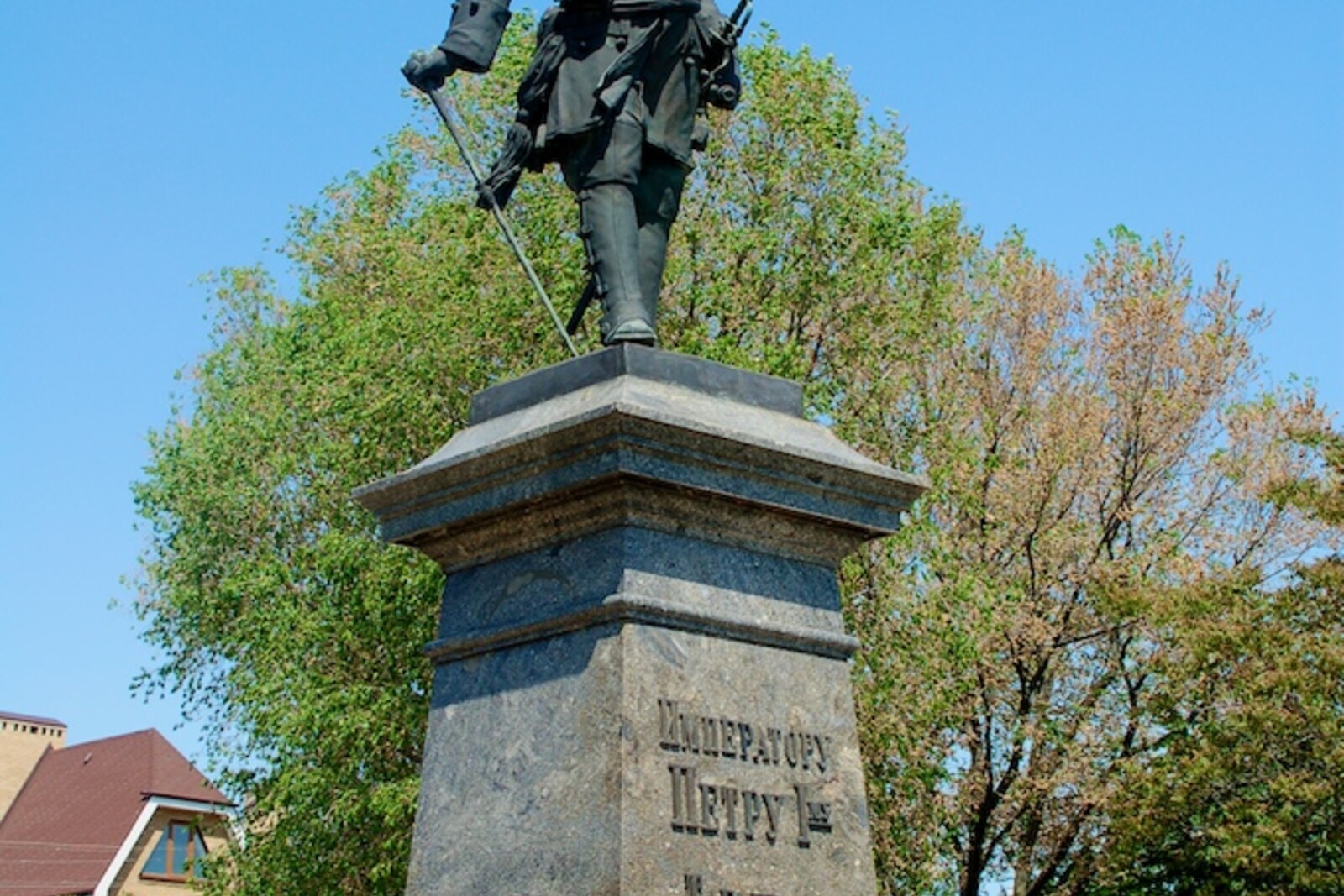A bronze monument to Peter the Great on a tall pedestal.