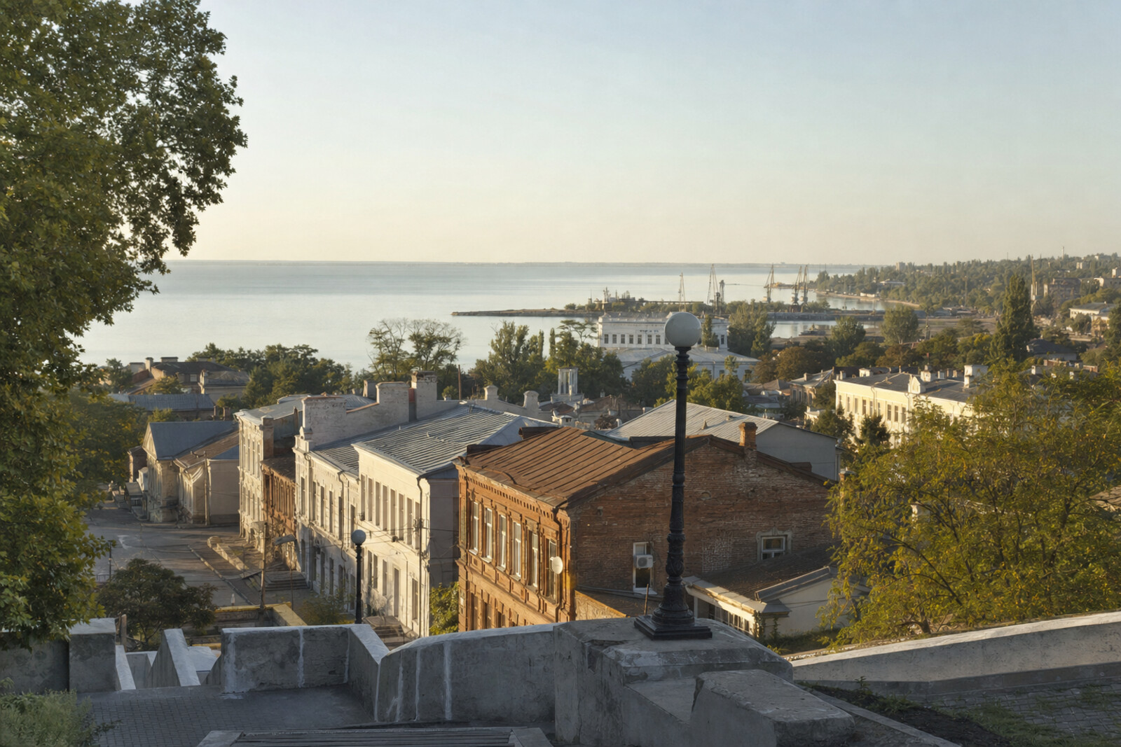 View from Taganrog's high bank over old merchant quarters, the Azov Bay and the port horizon.