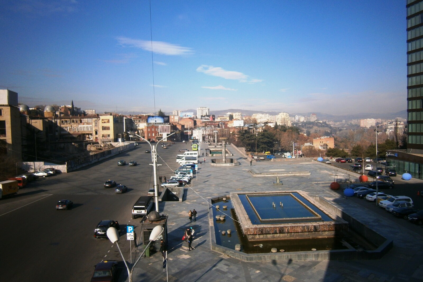 First Republic Square in Tbilisi with a concrete fountain and buildings around it