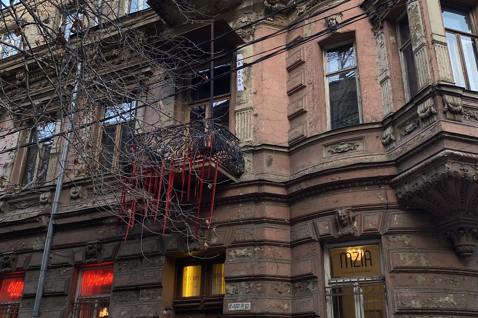Facade of the Ter-Akopova income-producing apartment building at 24 Galaktion Tabidze Street, with stucco decorations.