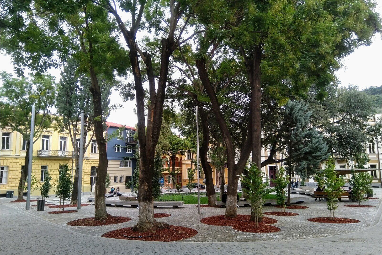 Restored houses and wooden balconies of Lado Gudiashvili Square after the 2018–2021 restoration.