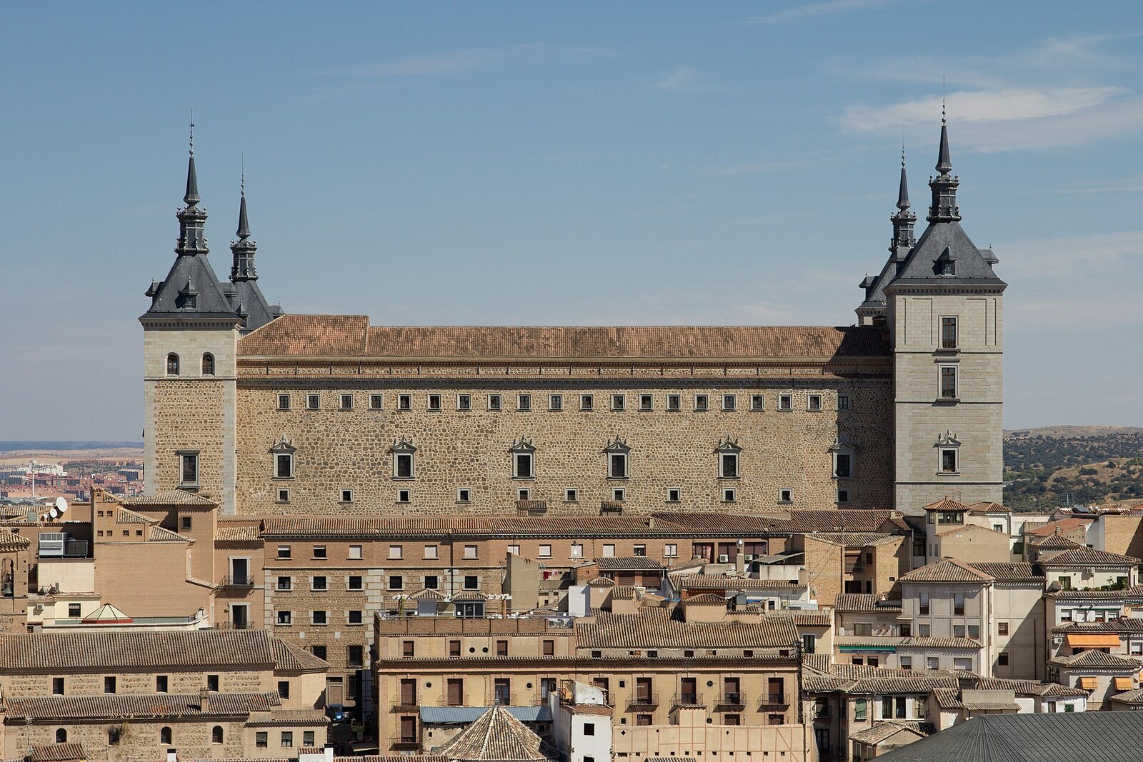 The massive Alcázar of Toledo with four corner towers.