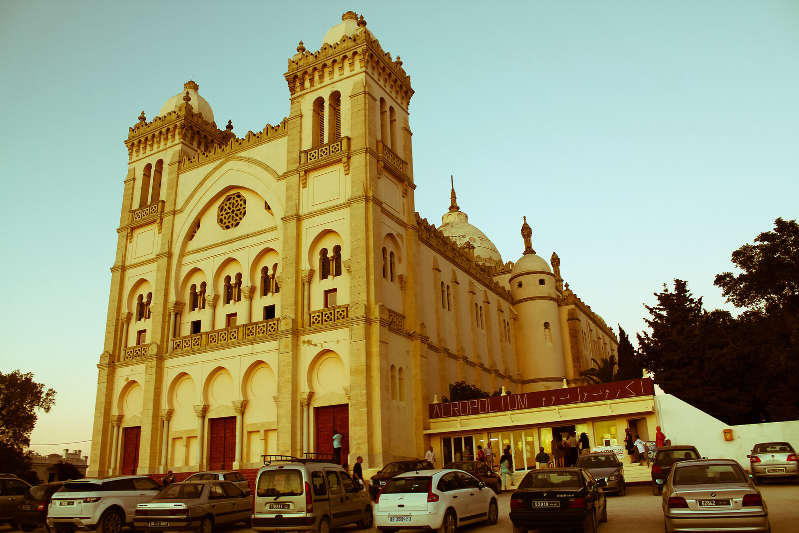The façade of the Acropolium with two towers and Byzantine arches.