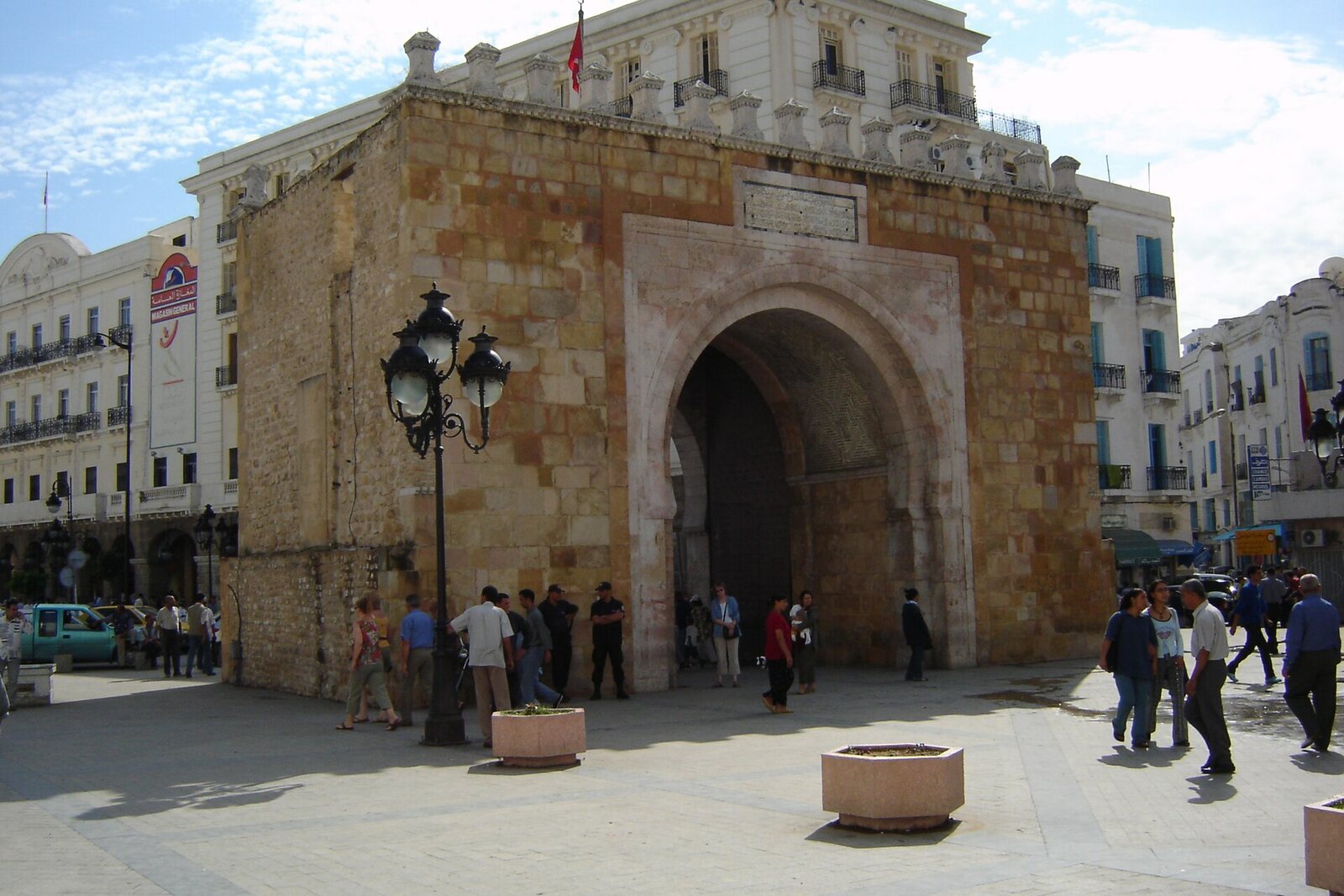 The stone arch of Bab el Bhar on an open square at the entrance to the medina.