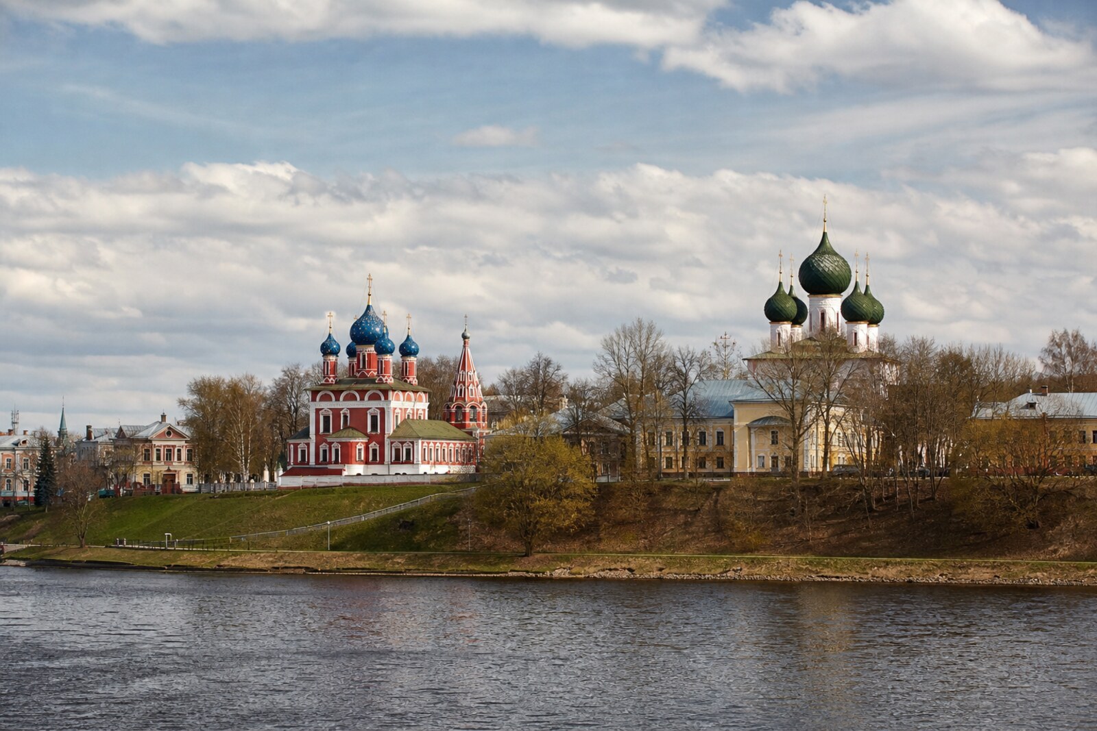 The Volga, the Kremlin, and Uglich's historic facades in northern river light.