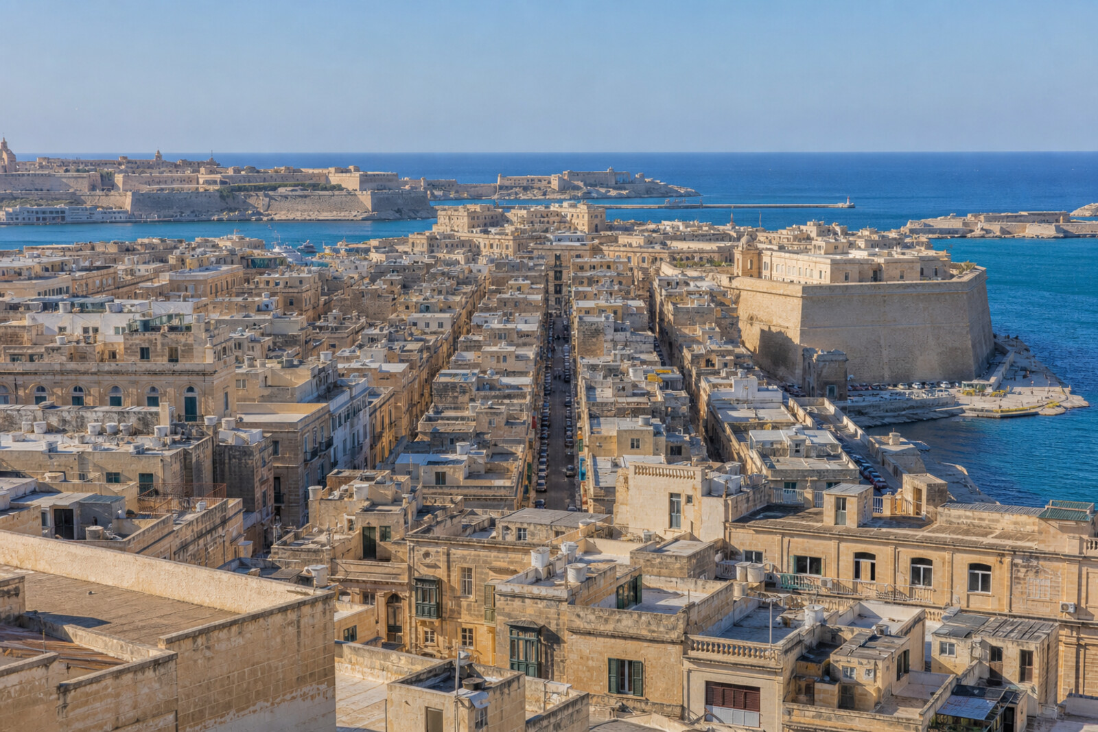 Stone streets and bastions of Valletta overlooking Malta's harbors.