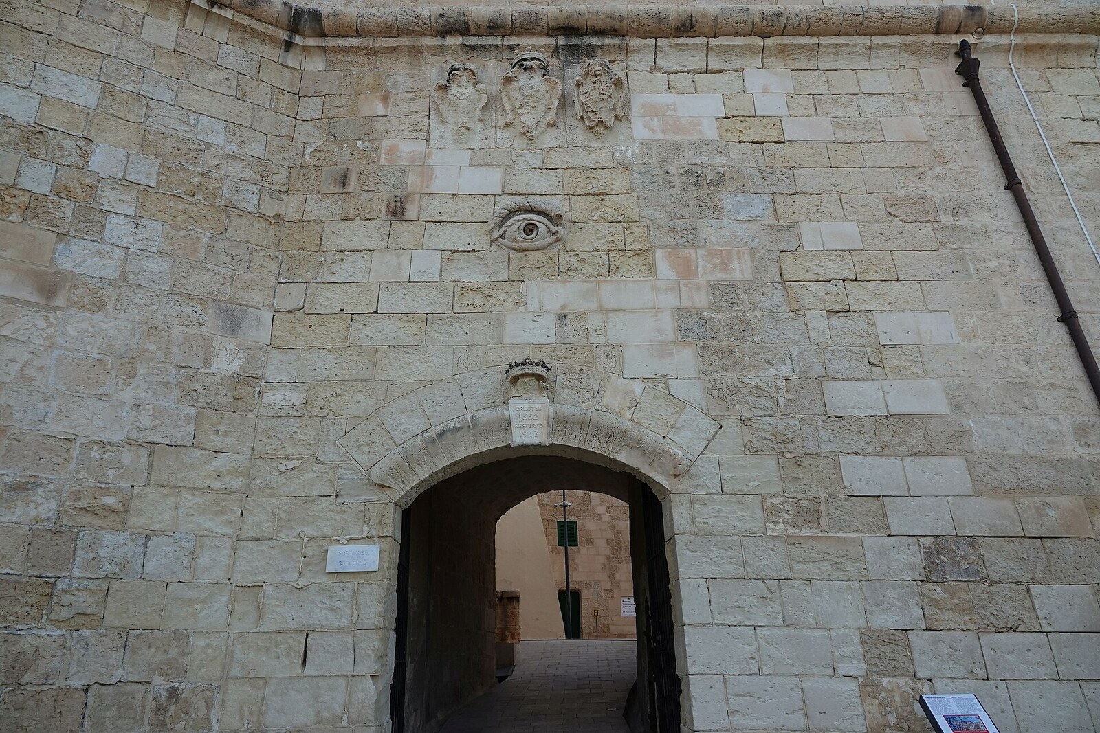 A sally port in the massive stone wall of Fort St Elmo.