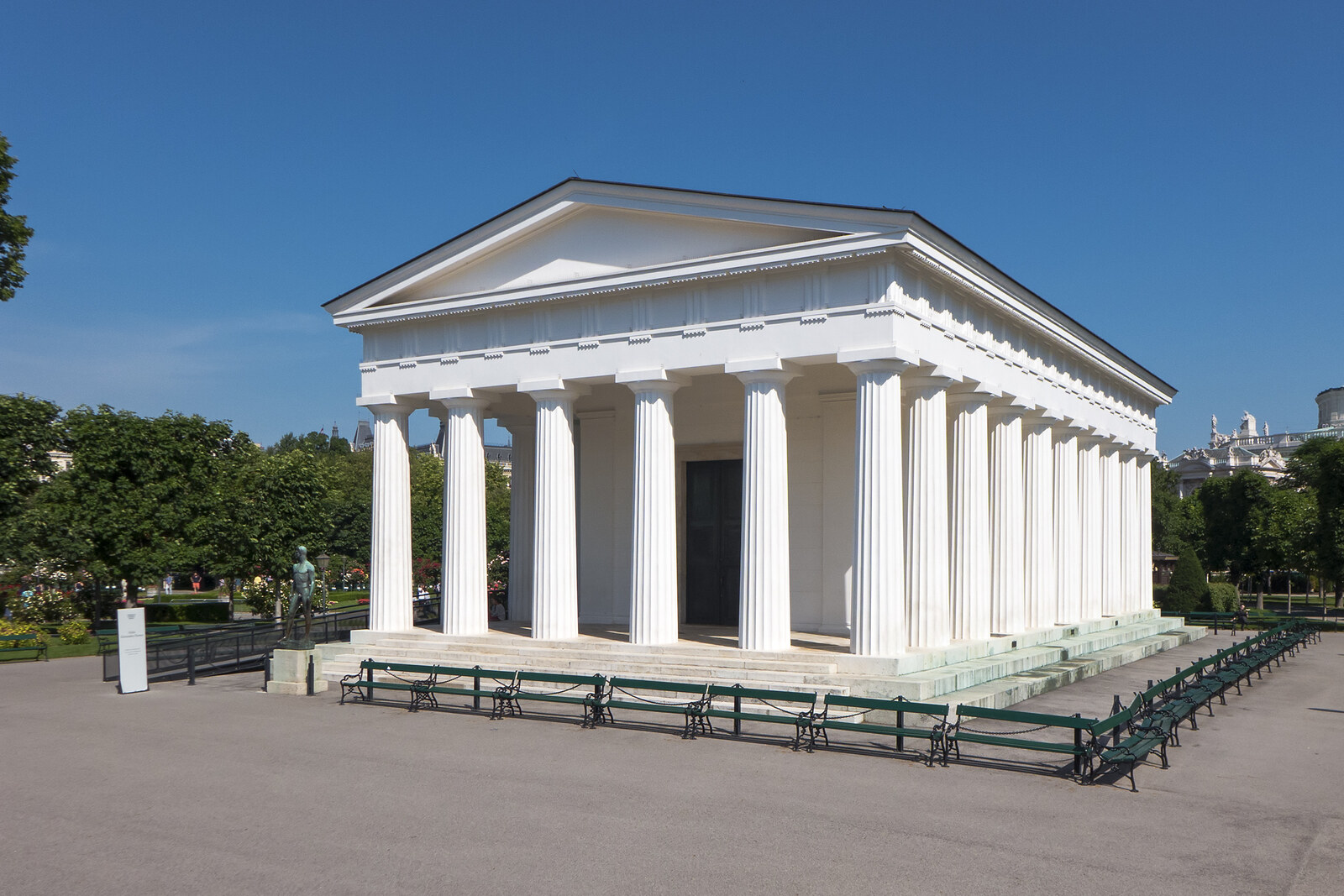 View of the Volksgarten with the Temple of Theseus and blooming roses
