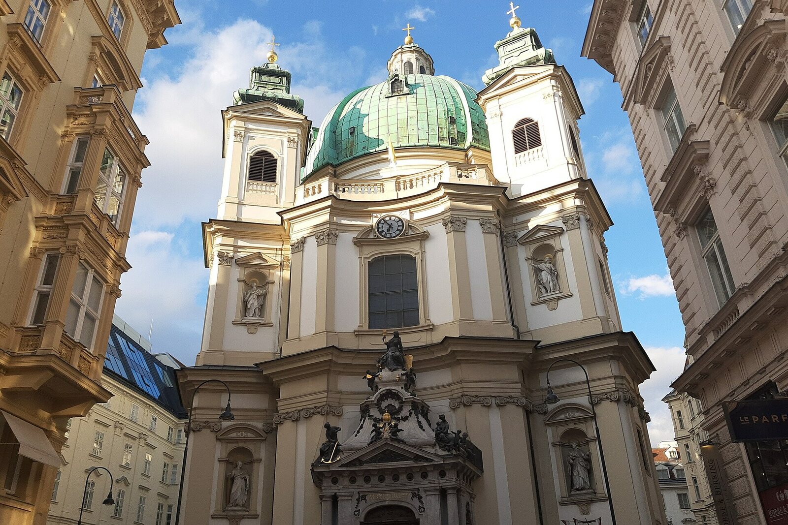 The Baroque façade of St. Peter's Church on the small Petersplatz square in Vienna.