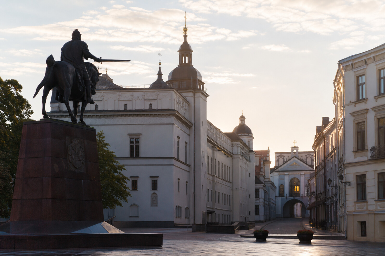The Monument to Gediminas and the Palace of the Grand Dukes of Lithuania recede into the perspective of the street leading to the Gate of Dawn.