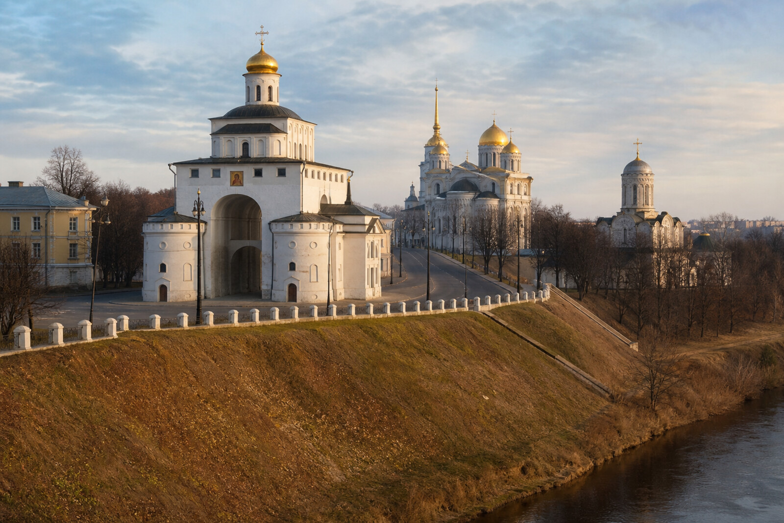 The white-stone Golden Gate, Assumption Cathedral, and Cathedral of Saint Demetrius on a high bank above the Klyazma.