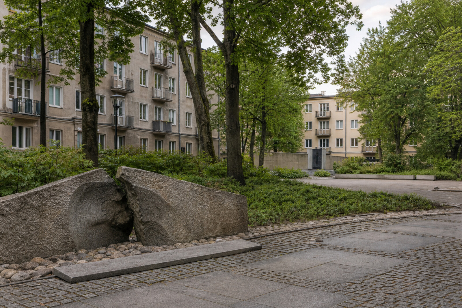 A symbolic image of Muranów: modern buildings and ghostly outlines of prewar streets.