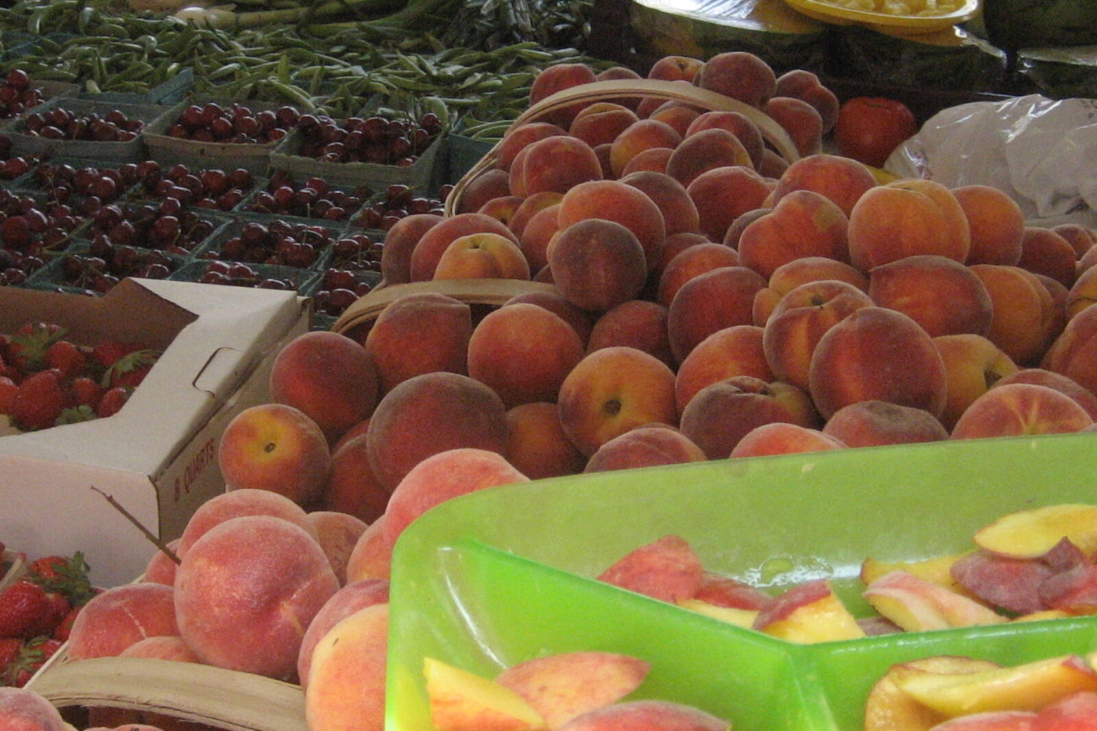 Bright berries and fruit on a counter at Eastern Market in Washington.