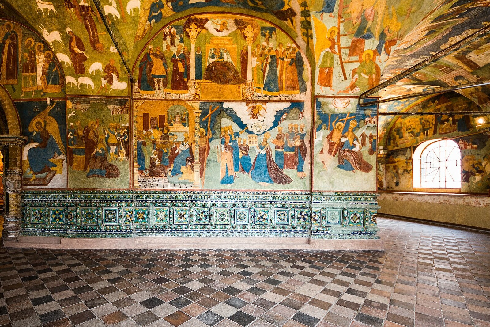 The walls and vaults of the Church of the Prophet Elijah, entirely covered with multi-figure frescoes.