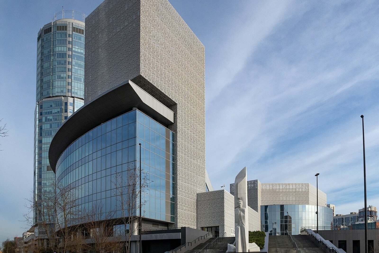 The perforated facade of the Yeltsin Center by City Pond.