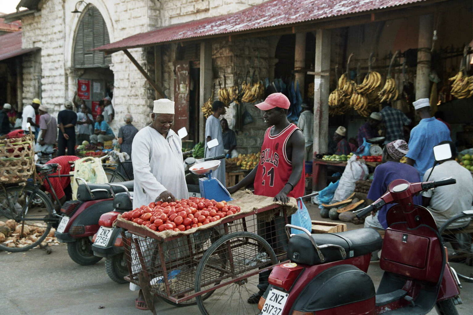 The facade of Darajani Market, with its arcade and the busy square in front